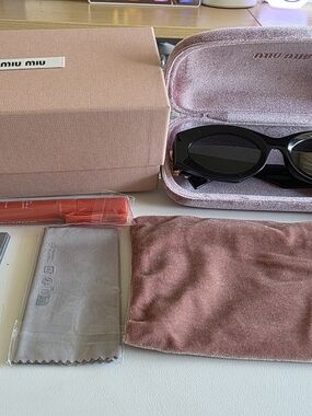 Miu Miu Black Oval Sunglasses with Pink Velvet Case and Pouch